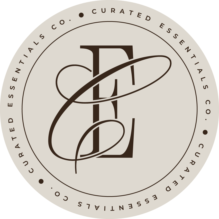 Curated Essentials Co. circular submark with the initials CE in brown script on a beige background
